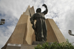 At the edge of each palm leaf is a statue of a soldier representing a stage of Algeria's struggle for independence.  The monument has been erected on the site of an ancient military fort.