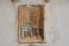 Unique tiles in the wall walking inside the Casbah areas.