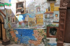 Local artists paint on the walls