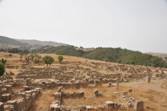 The city was built 3,000 feet above sea level during the 1st century AD as a Roman military garrison situated on a narrow triangular plateau in the province of Numidia. The terrain is somewhat rugged, being located at the confluence of two rivers.
