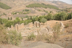 The Roman theater of Cuicul, Djemila, was constructed into the side of the hill overlooking the valley in the 2nd century AD.