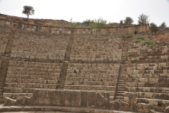 The forum is so large cut into a hillside that I needed to take 3 separate photos to show the size of it  including the next two photos to show it in its entirety. Its two tiers of seats could have accommodated 3,000 spectators. At one point they tore  down and rebuilt and an even bigger forum.