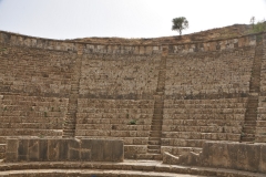 They surrounded it with larger and more impressive edifices than those that bordered the old forum. The terrain hindered building, so that they built the theater outside the town walls, which was exceptional.
