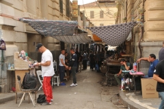 A street along side of this area for men's items to be purchased. 