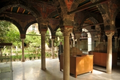 The palace is decorated with French and Tunisian tiles. There are also three courtyards and two fountains made of marble. The ceilings are tiled with marble as well. There are 540 doors made of cedar woods, inscribed and engraved with different sculptures and decorations.[
