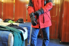 Getting ready to board a Zodiac for a first time onto ice and the Antarctic. I am wearing long johns, several layers of clothing, water proof coat and pants, with gloves and a knit hat.. All this for a California guy who does not know the meaning of the words "Below Zero".