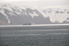 A Russian ship is also seen in the area.
