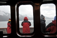 This is the view looking out the cabin windows I had on this trip at the front of the ship over the Bridge. What a thrill it was seeing Antarctic from this view site. You can see how everyone is dressed outside on the deck in front of the cabin I had. The fun part of the trip is I could see out and they could not see in.
