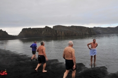Today was the chance to participate in a Polar Plunge. The water was 29 degrees and the air had warmed up to a high of 19F.. woo hoo. The next series of photos documents that I Jim Schroder along with about 18 others particiated in a polar plunge in just a bathing suit.