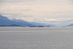 The outside entrance back into Ushuaia and Argentina. What an incredible experience this has been. To set foot on the Antarctic Continent. The 7th of all Continents in the world and the 7th for me. To visit, see, walk and climb up on, to smell, swim in the Antarctic Ocean in a bay in freezing waters. To see up close different types of penguins, seals, birds; to cruise around in a zodiac around gigantic icebergs, view the beauty of Antarctic in cold dreary days and the beautiful sunlit hours. To meet with the people that make their life studying Antarctic and work during the short season in Antarctic. It was a magical trip I will never forget.