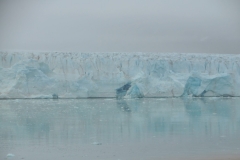 Glacier is a huge mass of ice. It is formed by the continuous deposition of snow and the transformation of that snow into ice. It is formed when the rate of deposition of snow is far greater than the rate of ablation. With the time, the ice transforms into sugar like granules. The granules grow larger with time and thus compress the air pockets present between them.