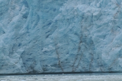 Glaciers appear blue in color.  Rayleigh effect plays an important part in the blue appearance of a glacier much like it does in the appearance of the sky as blue.