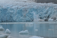 A second calving happens moments later at another location on the glacier.