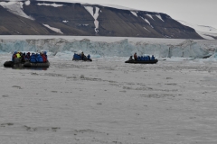 Fellow passengers out on zodiac runs  in the area of the Negribreen Glacier.