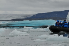 When the engines again were turned on and we began our journey back to the mother ship I mentioned to our expedition guide how sharp much of the ice was as we traversed above the water.  At that exact minute I heard the sudden crash of ice and then air coming out from under water from our zodiac. I looked up at every one and in a loud voice yelled, "we have a puncture".  Then I asked, "does anyone remember the song from Titanic?" The looks on several faces was priceless.