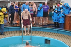 Yes that is the back of my head in the water and I cannot wait to get out of it. it was cold. So I can now say that I have done a polar swim in the Arctic in 2022 and in the Antarctic in 2019... both ends of the earth I have swam in both the Antarctic and the Arctic oceans.