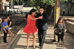 The tango is a distinctive partner dance which originated in the working-class port neighborhoods of Buenos Aires.