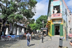 The centerpiece is the cobblestone strip, El Caminito, or little walkway. The one-time railway route is lined with the bright facades that make La Boca postcard perfect. Named for a 1926 tango song, the pedestrian lane features an outdoor fair where artists sell their wares and tango dancers prance along the sidewalk in between photo ops with tourists.