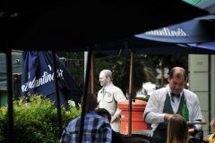 At the entrance of La Bioela restaurant is a statue of a service man waiting for his friends. The restaurant is along side the Gomero Tree and the Atlas man holding up the tree.