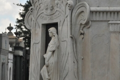 Another popular place to stop is Rufina Cambaceres' tomb. She was a young woman who was buried alive in the early 1900s, so her story is especially grisly. She appeared to be dead, perhaps being catatonic or in a coma, and was buried. A few days after her interment, workers heard screams from the tomb. When it was opened, she truly was dead but there were scratches on her face and on the inside of her coffin from her attempts to escape.