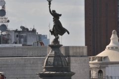 Even at the upper floors the buildings of Buenos Aires are famous for the statues floors above the street level. across the city.