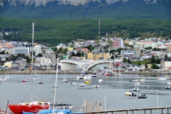 The Casino in the foreground next to the harbor.