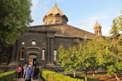 The 19th-century Cathedral of the Holy Mother of God. The church is topped with a large dome at the center surrounded with 2 minor domes. Unlike other Armenian churches, the altar at the Holy Mother of God is unique for its multi-iconic decoration.
