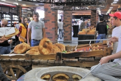 Here you see the hot bread being removed from the oven.