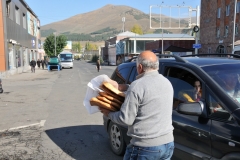 The locals were buying the bread by the handfull and carrying it out.