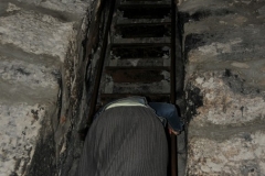 In this church is a pit where Gregory the Illuminator was held for 13 years. Here I am climbing into the dungeon down a steep ladder to the bottom area.