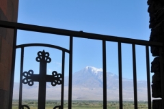 Mount Ararat in the distance looking through the Iron fence and cross.