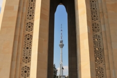 View of the Baku Television Tower through the Eternal Flame Memorial at Martyrs Lane