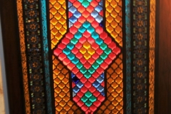 The glass is called Shabaka Glass window.  Wood, Glass and Geometry form the pieces of glass that makes these windows so spectacular.