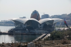 Located on land reclaimed from the Caspian Sea, Caspian Waterfront will be a 360,000  feet of entertainment, retail, leisure and dining destination over five floors. A central ‘flame’ tower completes eight angled glass façades inspired by the eight-pointed star on Azerbaijan’s national emblem.