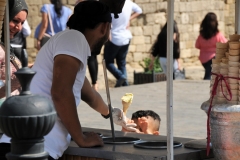 Finally the child catches the cone and gets his reward to eat the ice cream cone.