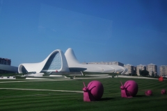 The Heydar Aliyev Center is a 619,000 sq ft building complex in Baku, Azerbaijan designed by Iraqi-British architect Zaha Hadid and noted for its distinctive architecture and flowing, curved style that eschews sharp angles.