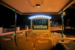 Traveling along the harbor side in the trolley train.