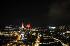 In the distance from the roof top of the hotel next door you can see the colors of the Flame Towers changing.