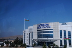 Private company on the outskirts of Baku. Notice the Azerbaijan flag blowing in the wind.