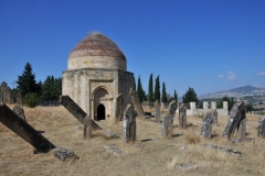 The octahedron turns to a hexahedron with the help of trumpet arches and then turns into a circle of the cupola with the help of angular rosettes. The cupola is distinguished for its trefoil arch. Trunk of the mausoleum is finished with cornice made of black stone and built in a shape of simple muqarnasses.