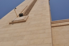 Looking straight up at the Tower of The Grand Mosque