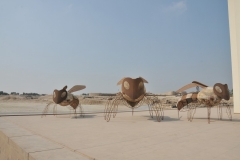 Bee design made of metal outside of Manama