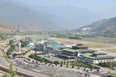 Paro airport has been described as "the most difficult airport in the world". The airport has only one runway, airplanes approach pass by 16,500 foot Himalayan Mountain peaks, and the 5,940 foot runway length presents a double challenge, due to low density altitude at the site. As a result, only a handful of airline pilots, 8 as of December 2014, are certified to operate commercial planes there.