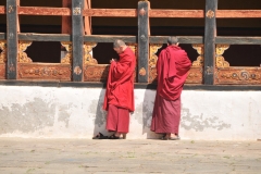 East meets West - Monks pausing to check their cell phones