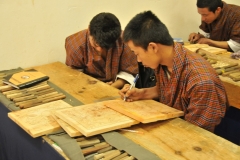National Institute for Zorig Chusum operates 4 to 6 year courses that provide instruction in Bhutan's 13 traditional Arts, Students specialise in painting, wood carving, embroidery and statue making.