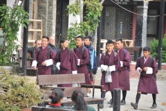 Young boys going home after school. Note their uniforms.