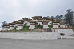 The Dochula Pass, located at 10,330 feet elevation, on the East road, in the snow covered Himalayas in Bhutan on the road from Thimphu to Punakha where 108 memorial Chortins or Stupas known as "Duk Wangal Chortins" have been built.