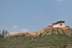 Remains of a nearby monastery destroyed by fire across the valley from Rincchengan Village.