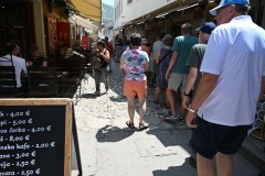Today we cross the border from Dubrovnik, Croatia into Bosnia & Herzegovina after stopping at the Oyster farms. We then drive on for 4 hours or more when we stop for lunch at the town of  Mostar. Here we are walking the narrow streets on our way to lunch. 