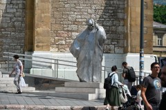 The Statue to the right is dedicated to Pope John Paul II when he visited Sarajevo in April 1997. 